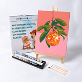 Discofrucht mit Farben und Pinseln
